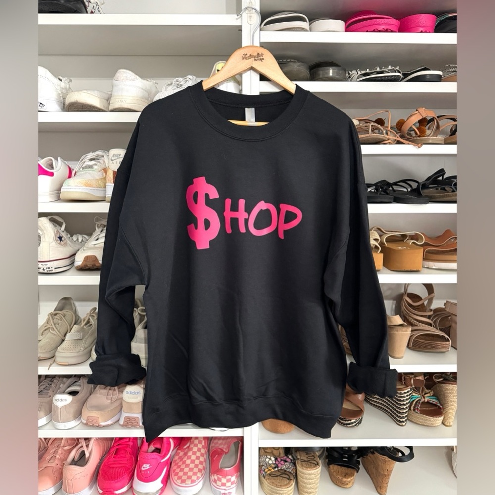 The Shop Sweatshirt – Black Pullover with Bold “$hop” Graphic for Street Style
